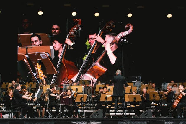 (210620) -- BONN, June 20, 2021 -- Musicians from Beethoven Orchestra Bonn stage an open-air concert in Bonn, Germany, on June 19, 2021. Some cultural events started to be held in Germany due to the relaxation of the anti-virus restrictions. (Photo by Xinhua) GERMANY-BONN-CONCERT-RESTRICTIONS-RELAXATION TangxYing 