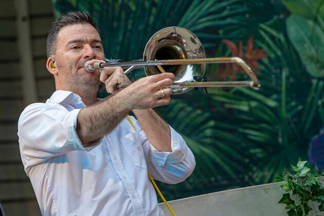The Dresden Reggae and Ska Band Yellow Umbrella on the picture Thomas Hellmich, trombone during their performance at the concert place Weißer Hirsch in Dresden