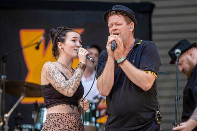 The Dresden Reggae and Ska Band Yellow Umbrella on the picture Veronika Kralacek and Jens Strohschnieder during their performance at the concert place Weißer Hirsch in Dresden