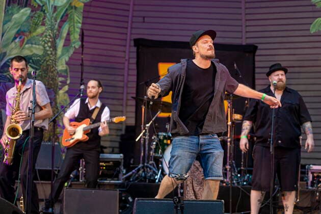 The Dresden reggae and ska band Yellow Umbrella on the picture Longfingah during their performance at the concert place Weißer Hirsch in Dresden