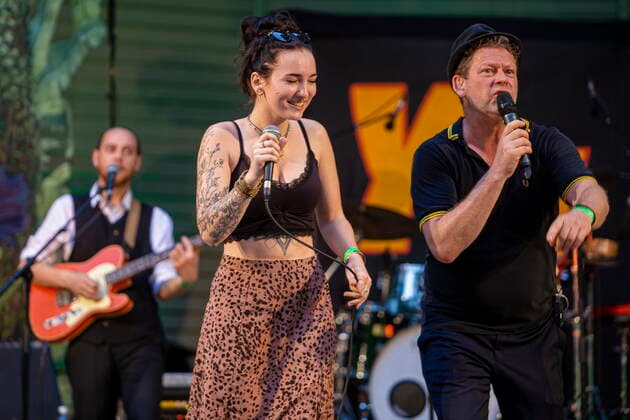 The Dresden Reggae and Ska Band Yellow Umbrella on the picture Veronika Kralacek and Jens Strohschnieder during their performance at the concert place Weißer Hirsch in Dresden