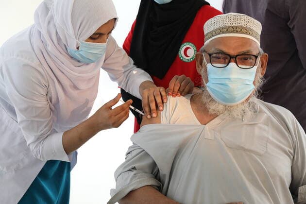 Virus Outbreak Bangladesh A man receives a first dose of Pfizer-BioNTech Covid-19 coronavirus vaccine in Dhaka, Bangladesh, on June 21, 2021. Dhaka Bangladesh ramany-notitle210621_npfcU  Copyright: xSonyxRamanyx