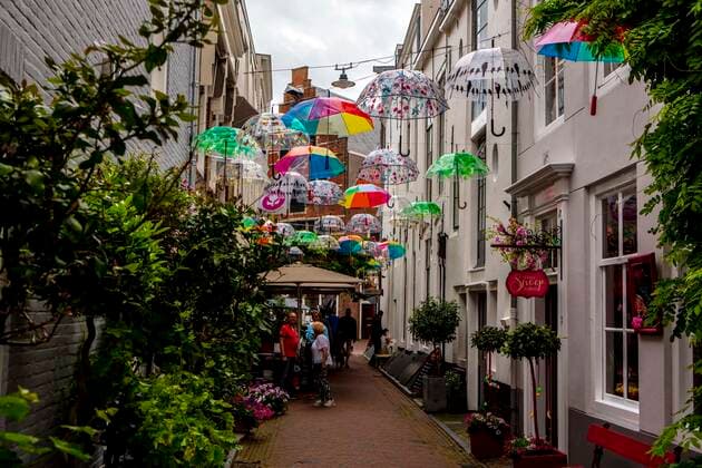 Umbrellas are stretched over the Paraplustraatje Umbrella Lane in Middelburg Zeeland NL Umbrellas