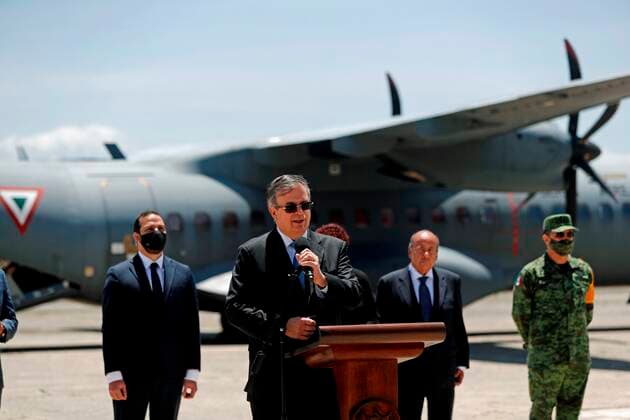 The Mexican Foreign Minister, Marcelo Ebrard, speaks during the donation to Guatemala of 150,000 doses of AstraZeneca vaccines on the central airfield runway of the Guatemalan Air Force, today, in Guatemala City, Guatemala, 24 June 2021. The Mexican Foreign Minister, Marcelo Ebrard, personally delivered a donation of 150,000 doses of AstraZeneca vaccines against covid-19 in Guatemala on Thursday and assured that a new identical shipment will be given soon. Ebrard arrived in the Central American country at noon on a Mexican Air Force plane and was received by Guatemalan Vice Chancellor Eduardo Hernandez and the Minister of Public Health and Social Assistance, Amelia Flores, for a brief ceremony to deliver the vaccines. EFE Esteban Biba Mex Copyright: xEstebanxBibax AME8228 20210624-907a6a1b10c0d13ccffeb7ce73bdc7341b74f064