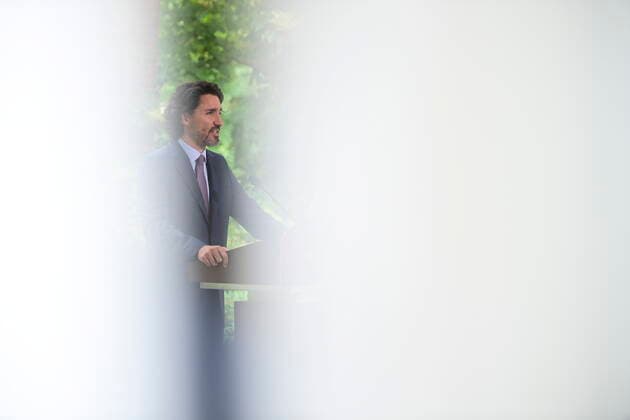 June 25, 2021, Ottawa, on, Canada: Prime Minister Justin Trudeau is photographed through a tarp tent as he holds a press conference at Rideau Cottage in Ottawa on Friday, June 25, 2021. Ottawa Canada  - ZUMAc35_ 20210625_zaf_c35_013 Copyright: xSeanxKilpatrickx