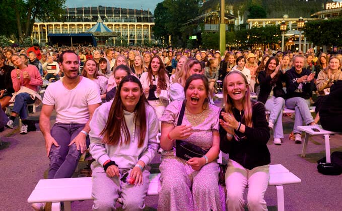 An enthusiastic audience for Danish Christopher who plays up to Havefest paa Plaenen in Tivoli on Friday 25 June 2021 with seated audience divided into two sections Havefest replaces Fredagsrock, which has been canceled due to the Covid 19 Corona crisis, Copenhagen  Copyright: TorbenxChristensen TorbenxChristensenx COP333 spdk20210626-010143-L