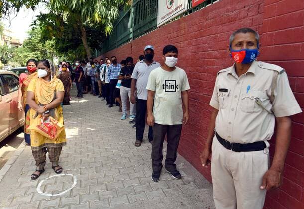 GURUGRAM, INDIA - JUNE 25: Beneficiaries wait to receive COVID-19 vaccine dose, at a vaccination centre in Sector 15, on June 25, 2021 in Gurugram, India. (Photo by Vipin Kumar Hindustan Times) COVID-19 Vaccination Drive