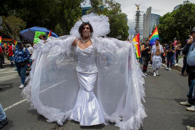 XLIII Edition Of LGBT+ Pride March In Mexico MEXICO CITY, MEXICO - JUNE 26: A person of LGBT community holds a rainbow flag while takes part during the XLIII annual pride LGBT+ march on the main avenue demanding equality, in response to the injustice that trans+ people are facing in their daily life in all over the world. Thousands of Lesbian, Gay, Bisexual and Transsexual (LGBT) join the Pride march around the world. On June 26, 2021 in Mexico City, Mexico. Copyright: xRicardoxFloresx EYEPIXGROUP_RFE_26062021_9614