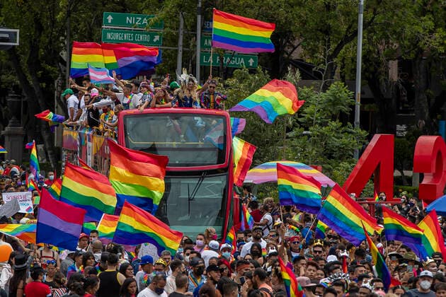 XLIII Edition Of LGBT+ Pride March In Mexico MEXICO CITY, MEXICO - JUNE 26: A group of LGBT community hold rainbow flags while takes part during the XLIII annual pride LGBT+ march on the main avenue demanding equality, in response to the injustice that trans+ people are facing in their daily life in all over the world. Thousands of Lesbian, Gay, Bisexual and Transsexual (LGBT) join the Pride march around the world. On June 26, 2021 in Mexico City, Mexico. Copyright: xRicardoxFloresx EYEPIXGROUP_RFE_26062021_9650