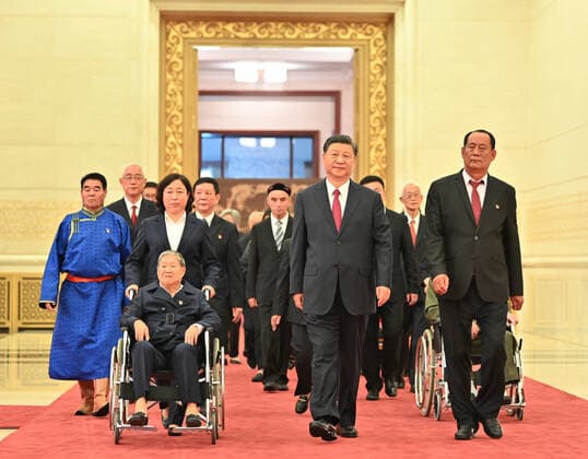 (210629) -- BEIJING, June 29, 2021 -- Chinese President Xi Jinping, also general secretary of the Communist Party of China (CPC) Central Committee and chairman of the Central Military Commission, walks with the recipients of the July 1 Medal, the Party s highest honor, into the venue of the award ceremony at the Great Hall of the People in Beijing, capital of China, June 29, 2021. The award ceremony of the July 1 Medal was held Tuesday morning at the Great Hall of the People in Beijing. ) CHINA-BEIJING-XI JINPING-JULY 1 MEDAL-AWARD CEREMONY (CN) LixTao 