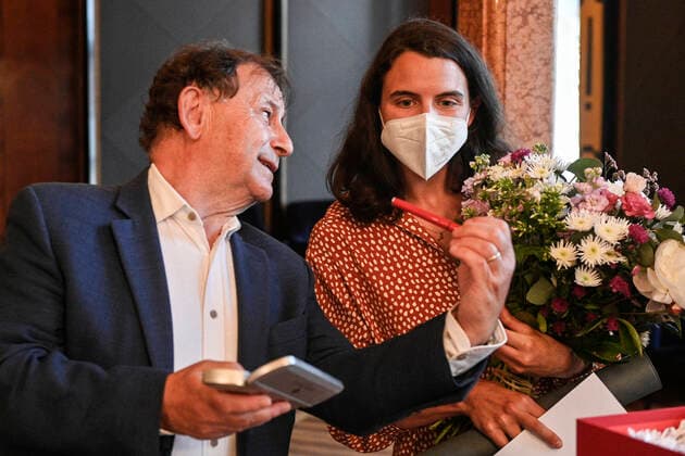 Czech playwright, actress and dancer Josefina Formanova, right, granddaughter of director Milos Forman and writer Jiri Stransky, receives the Tom Stoppard Award for best original essay in Czech language in Prague, Czech Republic, June 29, 2021. At left is the Vaclav Havel Library director Michael Zantovsky. (CTKxPhoto MichalxKamaryt) CTKPhotoP2021062908331  KMT 1
