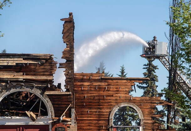June 30, 2021, Morinville, ab, Canada: St. John Baptiste Parish Catholic church is shown in Morinville Alta, on Wednesday June 30, 2021 as firefighters put out hot spots. A Catholic Church in northern Alberta has been destroyed by what RCMP are calling a suspicious fire. RCMP say in a release that officers were called to the blaze at St. John Baptiste Parish in Morinville, about 40 kilometres north of Edmonton, just after 3 a.m. Morinville Canada  - ZUMAc35_ 20210630_zaf_c35_004 Copyright: xJasonxFransonx