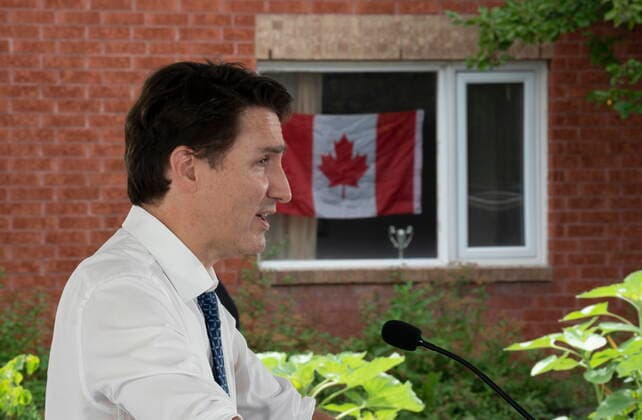 June 30, 2021, Ottawa, on, Canada: A Canadian flag is seen in a resident s window at the Shepherds of Food Hope residence as Prime Minister Justin Trudeau speaks during an announcement in Ottawa, Wednesday, June 30, 2021. Ottawa Canada  - ZUMAc35_ 20210630_zaf_c35_035 Copyright: xAdrianxWyldx