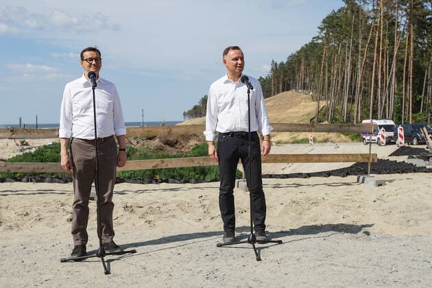 Poland Politics Daily President Andzej Duda (R) and PM Mateusz Morawiecki (L) visiting the construction site of a waterway connecting the Vistula Lagoon with the Gulf of Gdansk are seen in Nowy Swiat, Vistula Spit, Poland on 1 July 2021 Controversial The Vistula Spit canal is curently under construction canal across the Polish section of the Vistula Spit that will create a second connection between the Vistula Lagoon and Gdansk Bay (Baltic Sea) Nowy Swiat Poland fludra-polishpr210701_npDFf  Copyright: xMichalxFludrax