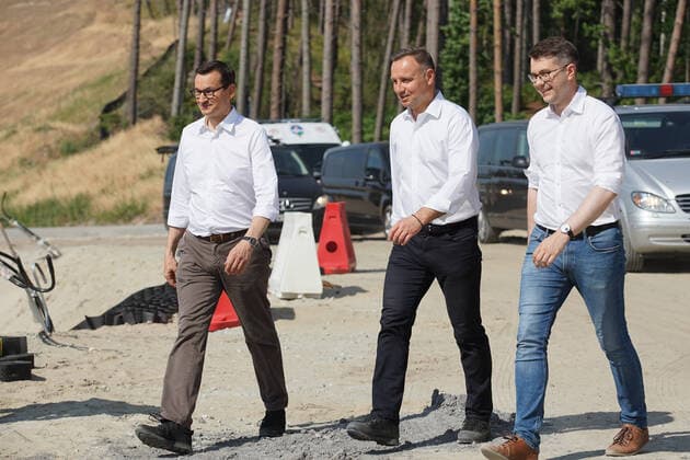 Poland Politics Daily President Andzej Duda (CR) and PM Mateusz Morawiecki (CL) visiting the construction site of a waterway connecting the Vistula Lagoon with the Gulf of Gdansk are seen in Nowy Swiat, Vistula Spit, Poland on 1 July 2021 Controversial The Vistula Spit canal is curently under construction canal across the Polish section of the Vistula Spit that will create a second connection between the Vistula Lagoon and Gdansk Bay (Baltic Sea) Nowy Swiat Poland fludra-polishpr210701_npPyt  Copyright: xMichalxFludrax