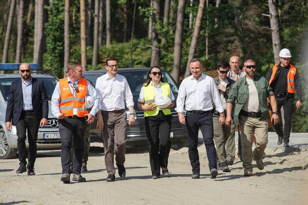 Poland Politics Daily President Andzej Duda (CR) and PM Mateusz Morawiecki (CL) visiting the construction site of a waterway connecting the Vistula Lagoon with the Gulf of Gdansk are seen in Nowy Swiat, Vistula Spit, Poland on 1 July 2021 Controversial The Vistula Spit canal is curently under construction canal across the Polish section of the Vistula Spit that will create a second connection between the Vistula Lagoon and Gdansk Bay (Baltic Sea) Nowy Swiat Poland fludra-polishpr210701_npV2c  Copyright: xMichalxFludrax