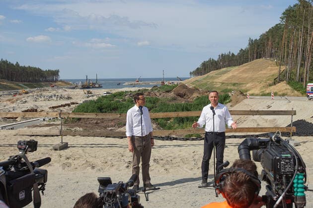 Poland Politics Daily President Andzej Duda (R) and PM Mateusz Morawiecki (L) visiting the construction site of a waterway connecting the Vistula Lagoon with the Gulf of Gdansk are seen in Nowy Swiat, Vistula Spit, Poland on 1 July 2021 Controversial The Vistula Spit canal is curently under construction canal across the Polish section of the Vistula Spit that will create a second connection between the Vistula Lagoon and Gdansk Bay (Baltic Sea) Nowy Swiat Poland fludra-polishpr210701_npRaT  Copyright: xMichalxFludrax