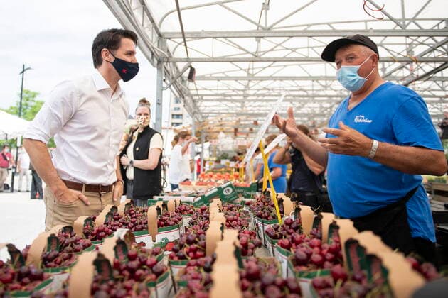 July 1, 2021, Ottawa, on, Canada: Prime Minister Justin Trudeau speaks with a vendor at the Parkdale Public Market in Ottawa as he shops with his family on Canada Day, Thursday, July 1, 2021. Ottawa Canada  - ZUMAc35_ 20210701_zaf_c35_030 Copyright: xJustinxTangx