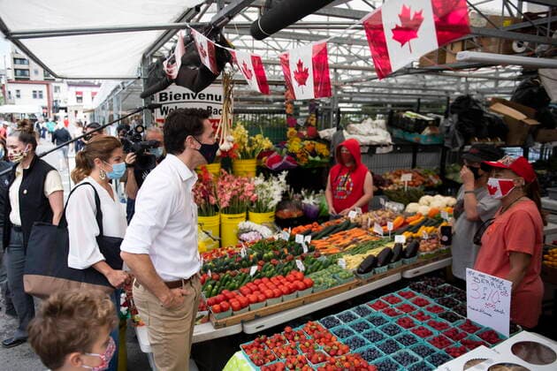 July 1, 2021, Ottawa, on, Canada: Prime Minister Justin Trudeau speaks with vendors at the Parkdale Public Market in Ottawa as he shops with his family on Canada Day, Thursday, July 1, 2021. Ottawa Canada  - ZUMAc35_ 20210701_zaf_c35_028 Copyright: xJustinxTangx