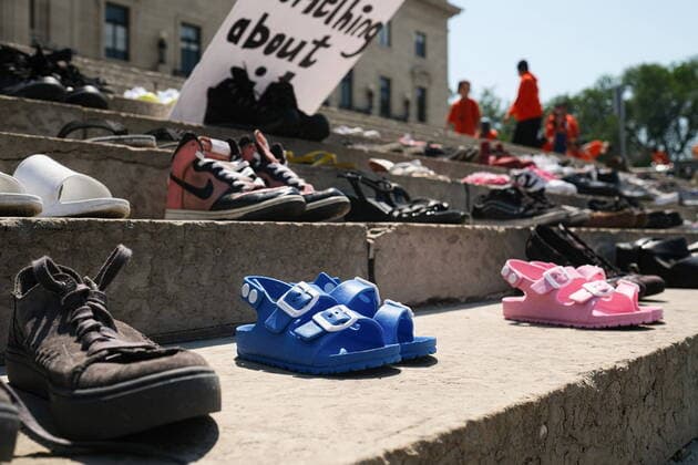 July 1, 2021, Winnipeg, mb, Canada: Shoes left on the stairs of the Winnipeg Legislative Building in support of residential school survivors and the lives lost are shown during a rally, Thursday, July 1, 2021 in Winnipeg. Winnipeg Canada  - ZUMAc35_ 20210701_zaf_c35_205 Copyright: xMikexSudomax