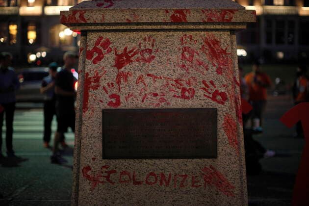 July 1, 2021, Victoria, BC, Canada: The statue of English explorer Capt. James Cook was removed from it s base at about 8:30 p.m. and tossed into the inner harbour and replaced with red hand prints and a red dress memorial in honour of missing and murdered Indigenous women and girls in Victoria, Thursday, July 1, 2021. Victoria Canada  - ZUMAc35_ 20210701_zaf_c35_301 Copyright: xChadxHipolitox