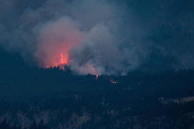 July 1, 2021, Lytton, BC, Canada: A wildfire burns on the side of a mountain in Lytton, B.C., at dusk on Thursday, July 1, 2021. Lytton Canada  - ZUMAc35_ 20210701_zaf_c35_313 Copyright: xDarrylxDyckx