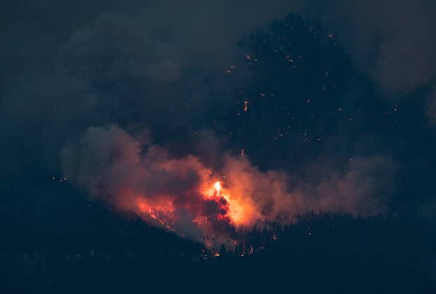 July 1, 2021, Lytton, BC, Canada: A wildfire burns in Lytton, B.C., at dusk on Thursday, July 1, 2021. Lytton Canada  - ZUMAc35_ 20210701_zaf_c35_317 Copyright: xDarrylxDyckx