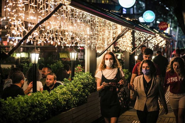 July 3, 2021, Ankara, Turkey: People eat at an open restaurant after midnight..President of the Republic of Turkey, Recep Tayyip Erdogan, announced his decision to normalize after the cabinet meeting he held on June 21. As of July 1, while the weekend curfew was lifted in Turkey, many restrictions were lifted due to the decrease in COVID-19 cases, and then normal life was returned. Ankara Turkey - ZUMAs197 20210703_zaa_s197_351 Copyright: xTunahanxTurhanx