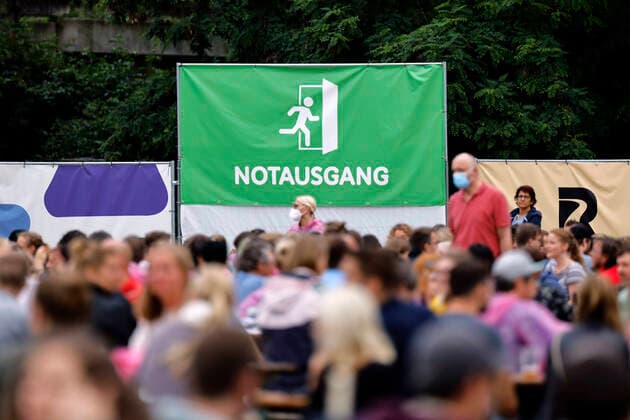 Emergency exit during Olli Schulzs performance at the BonnLive Kulturgarten Open Air The Bonn Live Kulturgarten Open Air Festival 2021 is a festival under Corona restrictions due to the Covid 19 pandemic Many event organizers hope for lasting relaxations for the event industry, as they have lost revenue due to Corona rules Symbol image, theme image Bon Foto:xC.xHardtx xFuturexImage