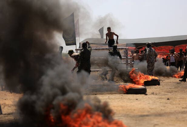July 4, 2021, Gaza city, Gaza Strip, Palestinian Territory: Young Palestinians take part in a military summer camp organised by the Islamic Jihad Movement, in Gaza City on July 04, 2021 Gaza city Palestinian Territory - ZUMAap3_ 20210704_zaf_ap3_083 Copyright: xDawoudxAboxAlkasx