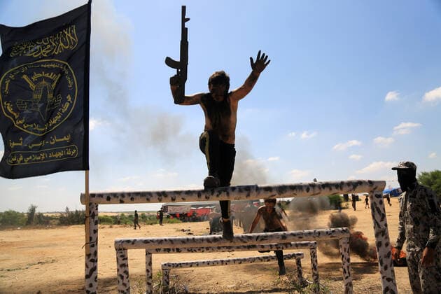 July 4, 2021, Gaza city, Gaza Strip, Palestinian Territory: Young Palestinians take part in a military summer camp organised by the Islamic Jihad Movement, in Gaza City on July 04, 2021 Gaza city Palestinian Territory - ZUMAap3_ 20210704_zaf_ap3_098 Copyright: xDawoudxAboxAlkasx