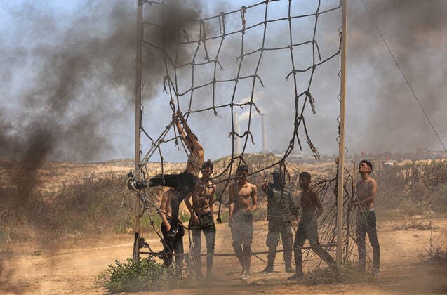 July 4, 2021, Gaza city, Gaza Strip, Palestinian Territory: Young Palestinians take part in a military summer camp organised by the Islamic Jihad Movement, in Gaza City on July 04, 2021 Gaza city Palestinian Territory - ZUMAap3_ 20210704_zaf_ap3_100 Copyright: xDawoudxAboxAlkasx