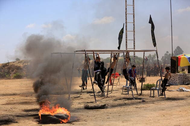 July 4, 2021, Gaza city, Gaza Strip, Palestinian Territory: Young Palestinians take part in a military summer camp organised by the Islamic Jihad Movement, in Gaza City on July 04, 2021 Gaza city Palestinian Territory - ZUMAap3_ 20210704_zaf_ap3_102 Copyright: xDawoudxAboxAlkasx