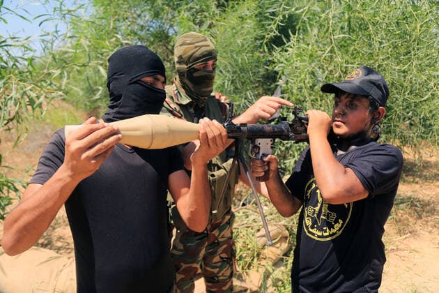 July 4, 2021, Gaza city, Gaza Strip, Palestinian Territory: Young Palestinians take part in a military summer camp organised by the Islamic Jihad Movement, in Gaza City on July 04, 2021 Gaza city Palestinian Territory - ZUMAap3_ 20210704_zaf_ap3_124 Copyright: xDawoudxAboxAlkasx