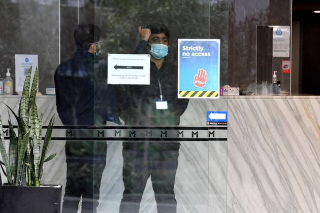 NSW CORONAVIRUS COVID19, Security guards are seen at the Meriton Suites in Waterloo are seen in Sydney, Tuesday, July 6, 2021. Health authorities have issued a stern warning after three new locally acquired COVID-19 cases were linked to a gathering in the Sydney apartment building. ( NO ARCHIVING, EDITORIAL USE ONLY, NO USE IN BOOKS WITHOUT CONSENT SYDNEY NSW AUSTRALIA  Copyright: xMICKxTSIKASx 20210706001555129465