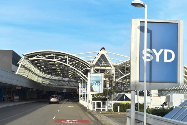 SYDNEY AIRPORT STOCK, The empty departures entrance is seen at Sydney Airport in Sydney, Tuesday, July 6, 2021. Sydney Airport?s biggest shareholder has tentatively backed delisting the company from the stock exchange, after superannuation giants sought to capitalise on the crisis in aviation through a non-binding $22 billion takeover bid. ( NO ARCHIVING, EDITORIAL USE ONLY, NO USE IN BOOKS WITHOUT CONSENT SYDNEY NSW AUSTRALIA  Copyright: xMICKxTSIKASx 20210706001555138948