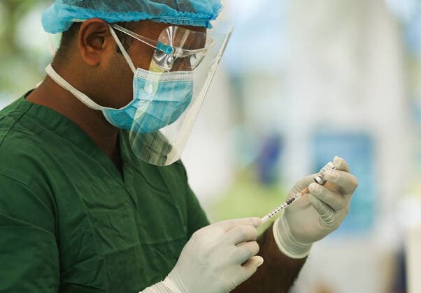 July 7, 2021, colombo, Sri Lanka: A Sri Lankan Army Medical officer prepares to administers a dose of Pfizer-BioNTech COVID-19 Vaccine at Army Hospital vaccination site in Colombo, Sri Lanka, July 7, 2021. Sri Lankan health authorities on Wednesday began rolling out doses of the Pfizer vaccine for those who have received only the first dose of the AstraZeneca vaccine colombo Sri Lanka. - ZUMAd152 20210707_znp_d152_012 Copyright: xPradeepxDambaragex