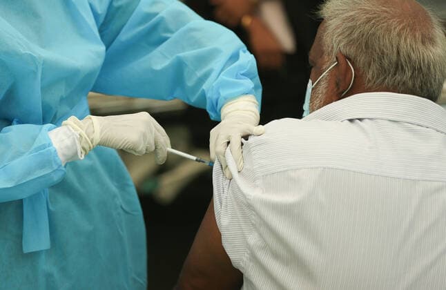July 7, 2021, colombo, Sri Lanka: A Sri Lankan Army Medical officer administers a dose of Pfizer-BioNTech COVID-19 Vaccine to an elderly man at Army Hospital vaccination site in Colombo, Sri Lanka, July 7, 2021. Sri Lankan health authorities on Wednesday began rolling out doses of the Pfizer vaccine for those who have received only the first dose of the AstraZeneca vaccine. colombo Sri Lanka. - ZUMAd152 20210707_znp_d152_004 Copyright: xPradeepxDambaragex