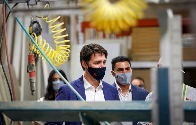 July 7, 2021, Calgary, ab, Canada: Prime Minister Justin Trudeau tours the AAA Door company in Calgary, Alta., Wednesday, July 7, 2021. Calgary Canada  - ZUMAc35_ 20210707_zaf_c35_001 Copyright: xJeffxMcintoshx