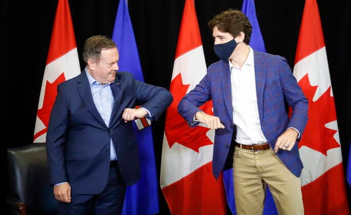 July 7, 2021, Calgary, ab, Canada: Prime Minister Justin Trudeau, right, elbow bumps with with Alberta Premier Jason Kenney as the two meet in Calgary, Alta., Wednesday, July 7, 2021. Calgary Canada - ZUMAc35_ 20210707_zaf_c35_013 Copyright: xJeffxMcintoshx
