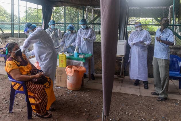 Coronavirus Emergency In Sri Lanka Sri Lankan military personnel gave a dose senior citizens given Pfizer-BioNTech vaccine as the second dose in vaccination center near Colombo on July 7, 2021 Colombo Sri Lanka jayawardana-notitle210707_np8di  Copyright: xAkilaxJayawardanax