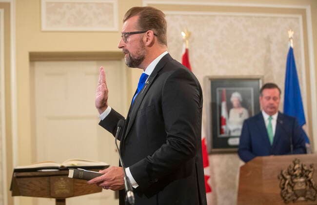 July 8, 2021, EDMONTON, ab, Canada: Newly-appointed Associate Minister of Mental Health and Addictions Mike Ellis takes an oath during a cabinet shuffle a Government House in Edmonton on Thursday, July 8, 2021. EDMONTON Canada  - ZUMAc35_ 20210708_zaf_c35_029 Copyright: xJasonxFransonx