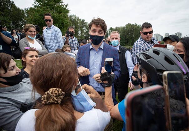 July 8, 2021, Coquitlam, BC, Canada: Prime Minister Justin Trudeau greets people in the crowd as he arrives for an announcement and news conference at Lafarge Lake Park, in Coquitlam, B.C., on Thursday, July 8, 2021. Coquitlam Canada  - ZUMAc35_ 20210708_zaf_c35_037 Copyright: xDarrylxDyckx
