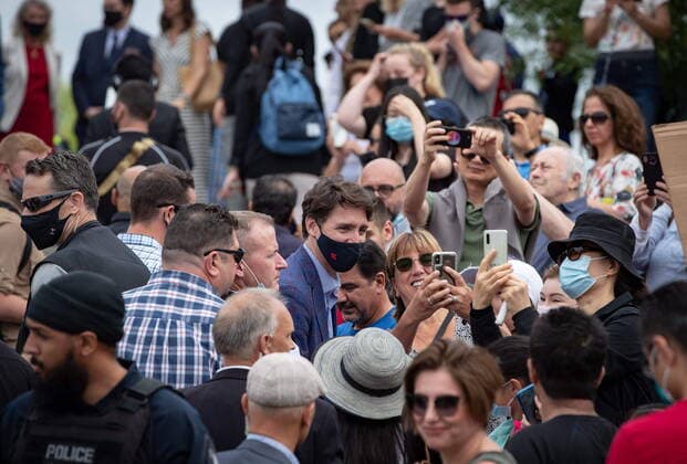 July 8, 2021, Coquitlam, BC, Canada: Prime Minister Justin Trudeau poses for selfies in the crowd as he leaves after an announcement and news conference at Lafarge Lake Park, in Coquitlam, B.C., on Thursday, July 8, 2021. Coquitlam Canada  - ZUMAc35_ 20210708_zaf_c35_041 Copyright: xDarrylxDyckx