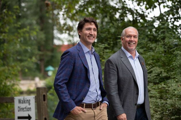 July 8, 2021, Coquitlam, BC, Canada: Prime Minister Justin Trudeau, front left, and B.C. Premier John Horgan arrive for an announcement and news conference at Lafarge Lake Park, in Coquitlam, B.C., on Thursday, July 8, 2021. Coquitlam Canada - ZUMAc35_ 20210708_zaf_c35_046 Copyright: xDarrylxDyckx