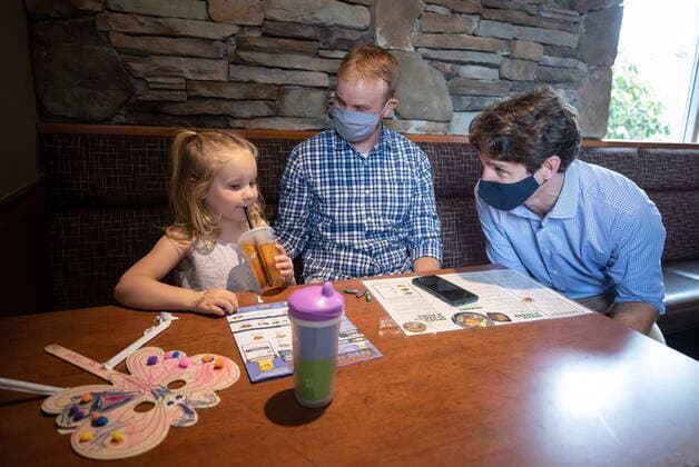 July 8, 2021, Coquitlam, BC, Canada: Prime Minister Justin Trudeau sits down to talk with people having lunch at a White Spot restaurant in Coquitlam, B.C., on Thursday, July 8, 2021. Coquitlam Canada  - ZUMAc35_ 20210708_zaf_c35_056 Copyright: xDarrylxDyckx