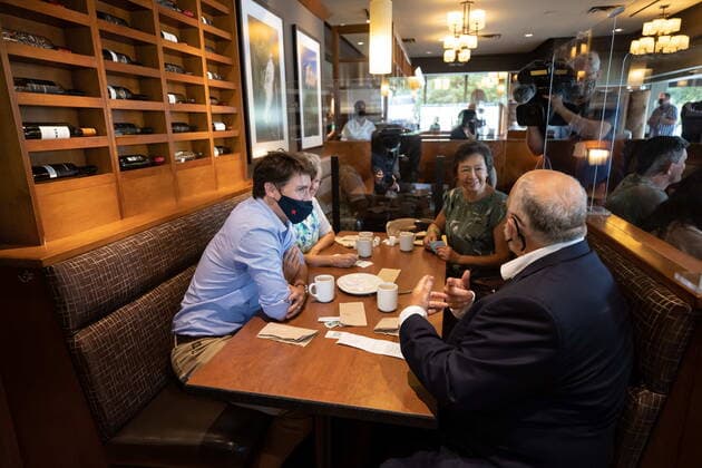 July 8, 2021, Coquitlam, BC, Canada: Prime Minister Justin Trudeau sits down to talk with people having lunch at a White Spot restaurant in Coquitlam, B.C., on Thursday, July 8, 2021. Coquitlam Canada  - ZUMAc35_ 20210708_zaf_c35_057 Copyright: xDarrylxDyckx
