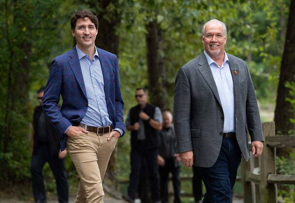 July 8, 2021, Coquitlam, BC, Canada: Prime Minister Justin Trudeau, left, and B.C. Premier John Horgan arrive for an announcement and news conference at Lafarge Lake Park, in Coquitlam, B.C., on Thursday, July 8, 2021. Coquitlam Canada - ZUMAc35_ 20210708_zaf_c35_059 Copyright: xDarrylxDyckx
