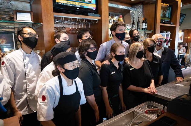 July 8, 2021, Coquitlam, BC, Canada: Prime Minister Justin Trudeau poses for a photograph with staff at a White Spot restaurant in Coquitlam, B.C., on Thursday, July 8, 2021. Coquitlam Canada  - ZUMAc35_ 20210708_zaf_c35_060 Copyright: xDarrylxDyckx