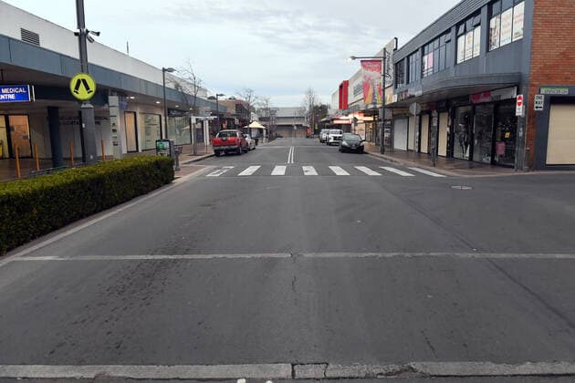 NSW POLICE COVID19 COMPLIANCE, An empty street in the shopping district is seen in the southwestern suburb of Fairfield in Sydney, Friday, July 9, 2021. At least 100 more police will be deployed to southwest Sydney from Friday in a high-visibility operation to ensure compliance with public health orders. ( NO ARCHIVING, EDITORIAL USE ONLY, NO USE IN BOOKS WITHOUT CONSENT SYDNEY NSW AUSTRALIA  Copyright: xMICKxTSIKASx 20210709001555892045